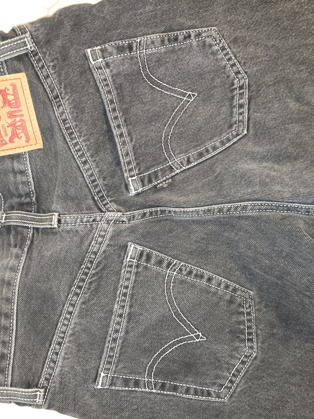 Relaxed Black Women's Jeans with Whipstitch Pocket Detail